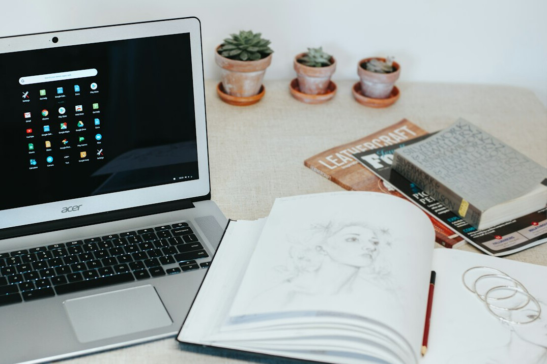 coding books and laptop