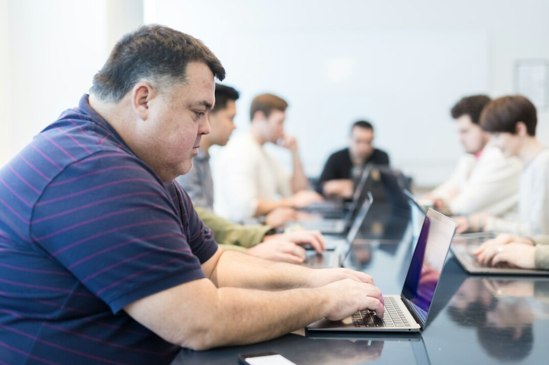 diverse group coding together